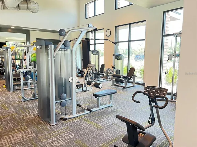 a view of a livingroom with furniture and a window
