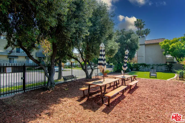 a view of a bench in a backyard