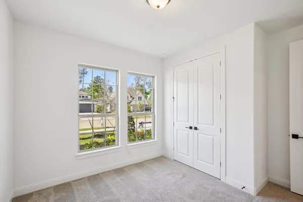 an empty room with windows