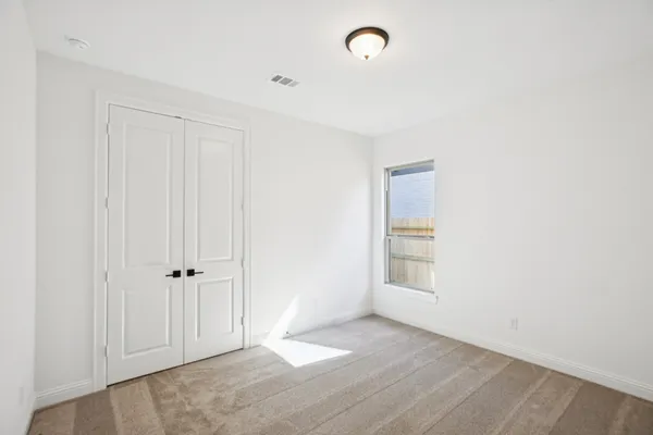 an empty room with window