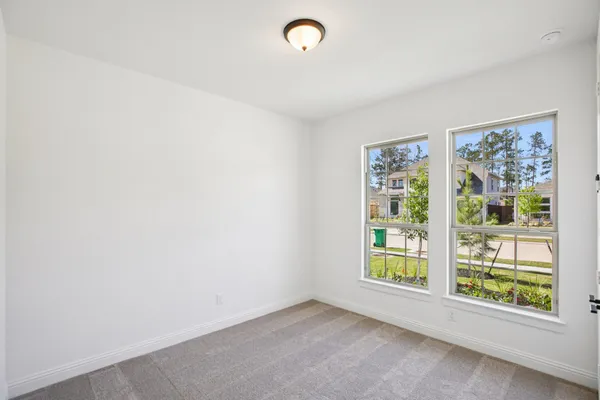 an empty room with windows