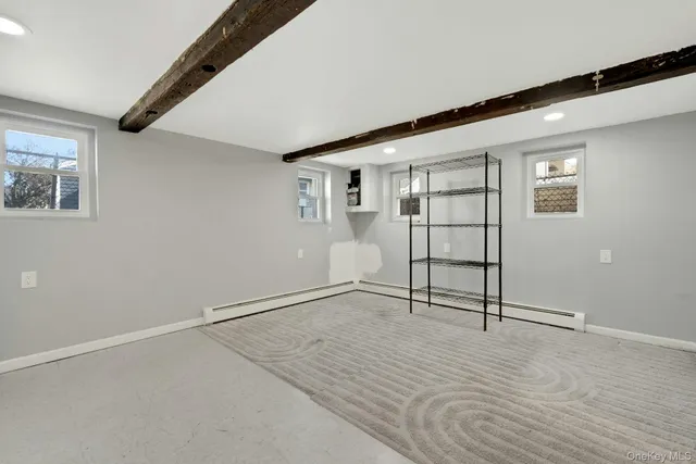 a view of a livingroom with walk in closet