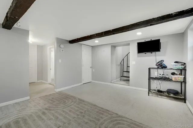 a bathroom with a sink mirror toilet and vanity