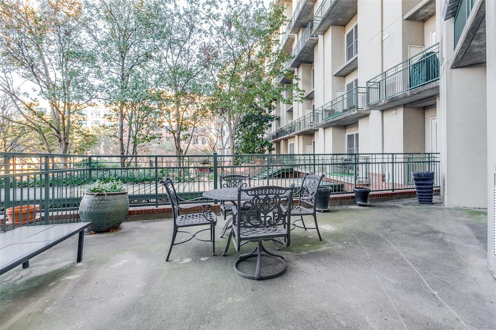 5055 Addison Circle, Unit 205 Addison, TX 75001 - Photo 22 of 24 Great area to entertain, grill, overlook pool and garden area.