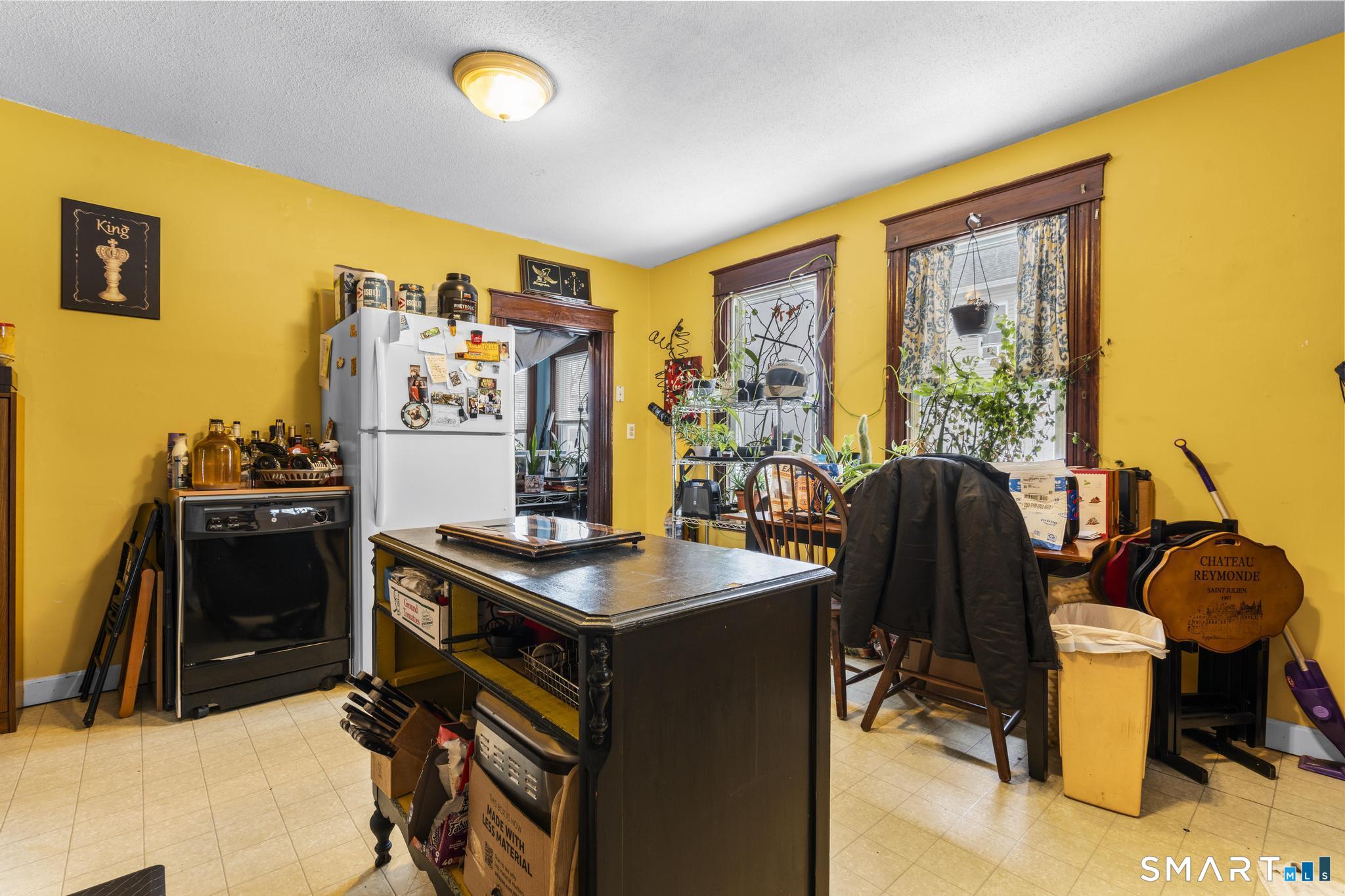 33 Kenney Street Bristol, CT 06010 - Photo 14 of 40 a view of a workspace with furniture and a window
