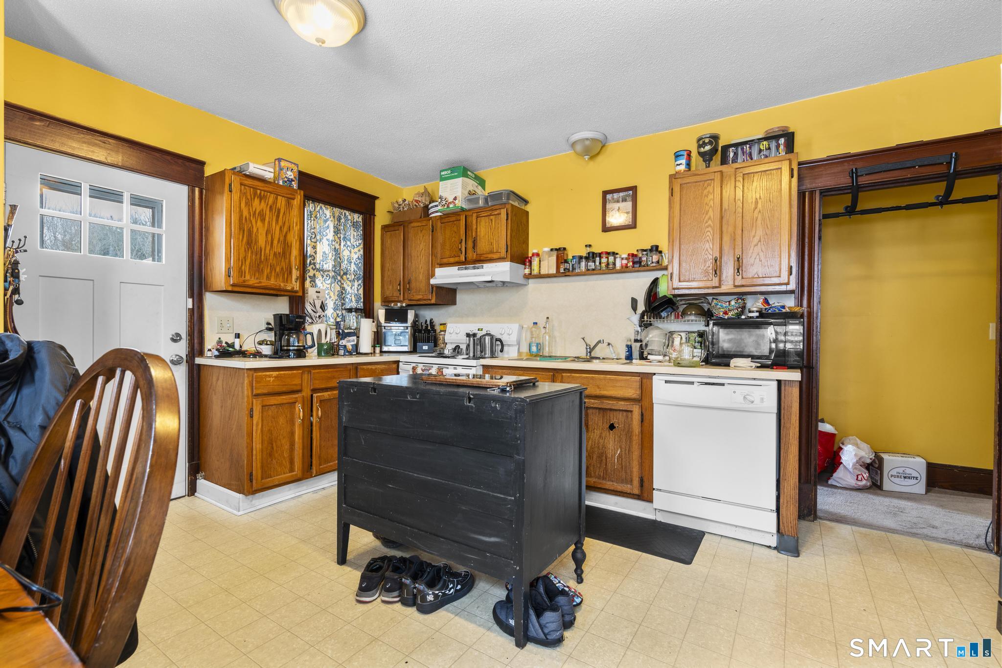 33 Kenney Street Bristol, CT 06010 - Photo 16 of 40 a kitchen with a sink appliances and cabinets