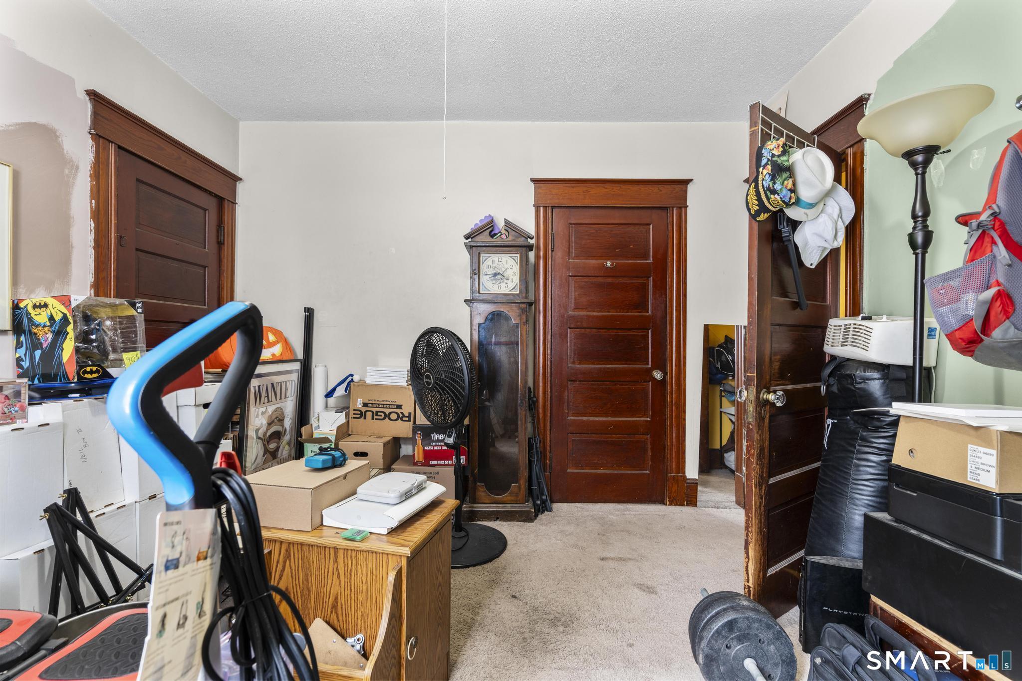 33 Kenney Street Bristol, CT 06010 - Photo 23 of 40 a room with furniture and musical instruments