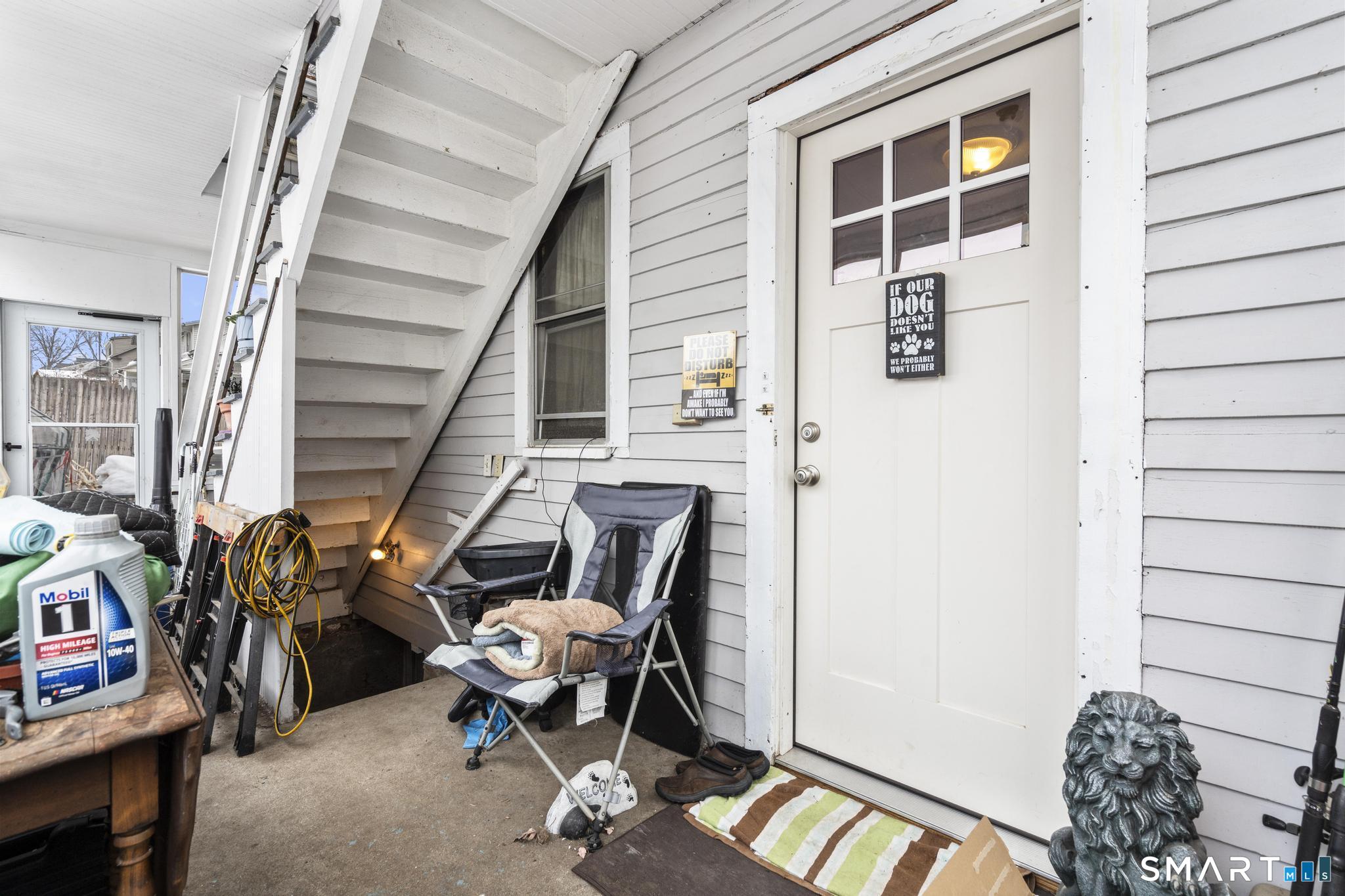 33 Kenney Street Bristol, CT 06010 - Photo 24 of 40 a living room with furniture a rug and a window