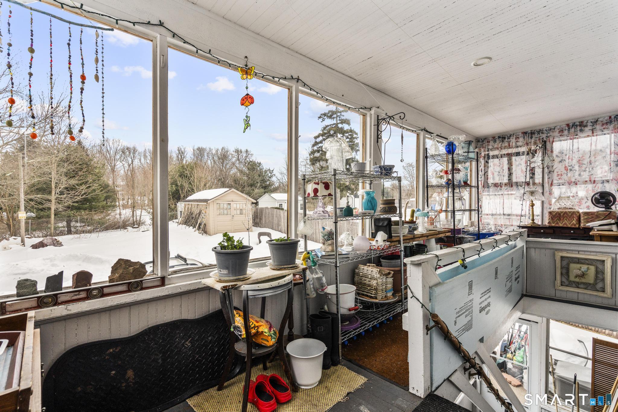 33 Kenney Street Bristol, CT 06010 - Photo 26 of 40 a very nice looking living room with a large window and a dining table