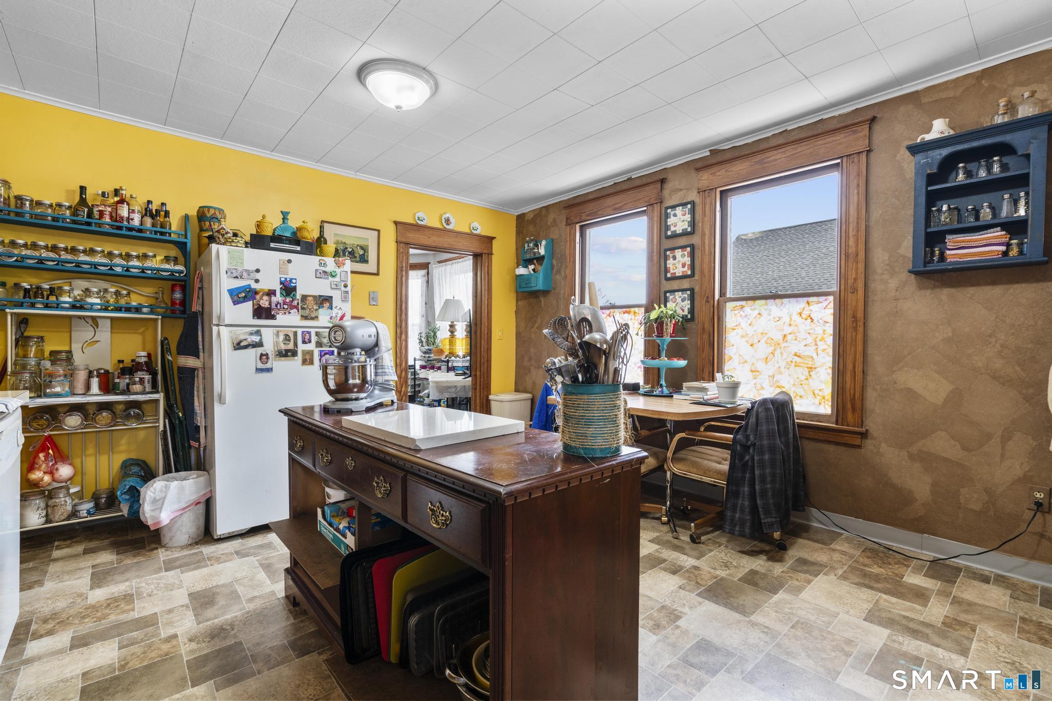33 Kenney Street Bristol, CT 06010 - Photo 27 of 40 a view of a workspace with furniture and a window