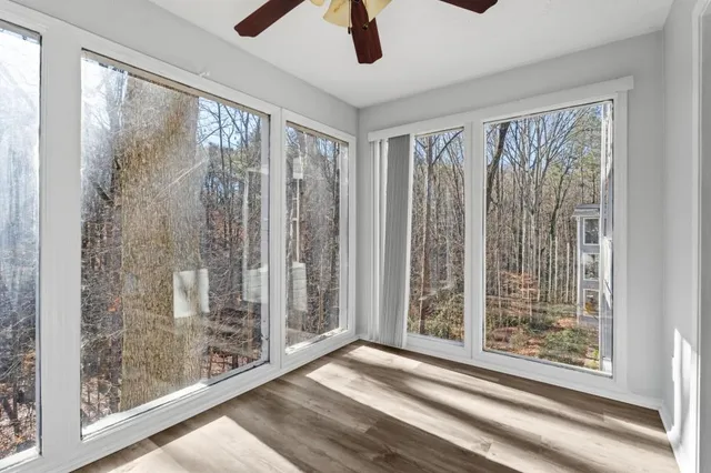 a view of a room with a large window