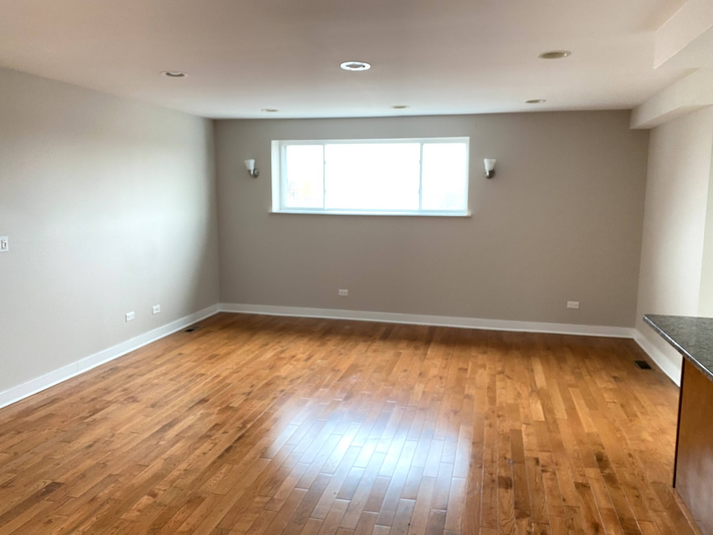 2245 West 21st Street, Unit 4 Chicago, IL 60608 - Photo 8 of 16 a view of a room with wooden floor and window