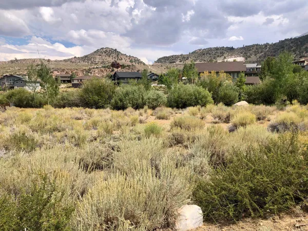 a view of a houses with a yard