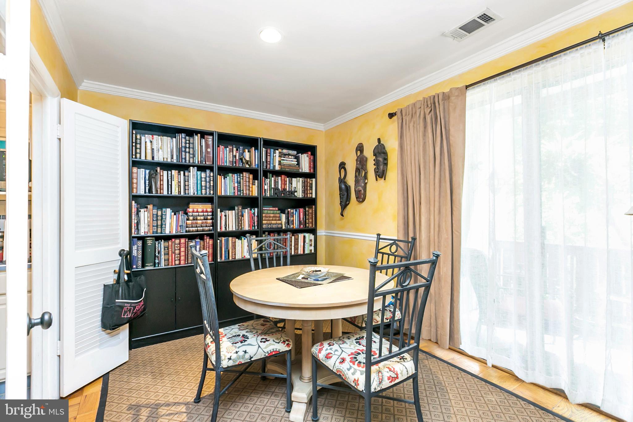111 Cross Keys Road, Unit R111D Baltimore, MD 21210 - Photo 6 of 15 Dining room with sliding doors to balcony