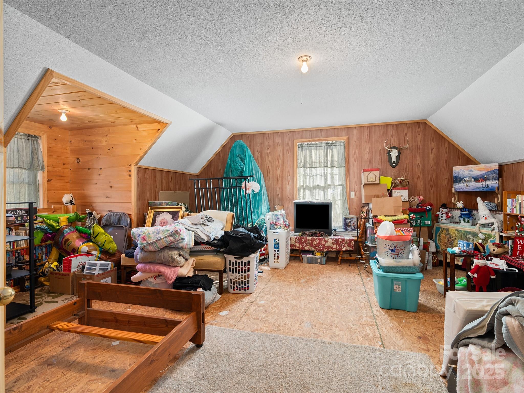 70 Pierce Elders Road Whittier, NC 28789 - Photo 22 of 36 a room with lots of furniture and a view of living room