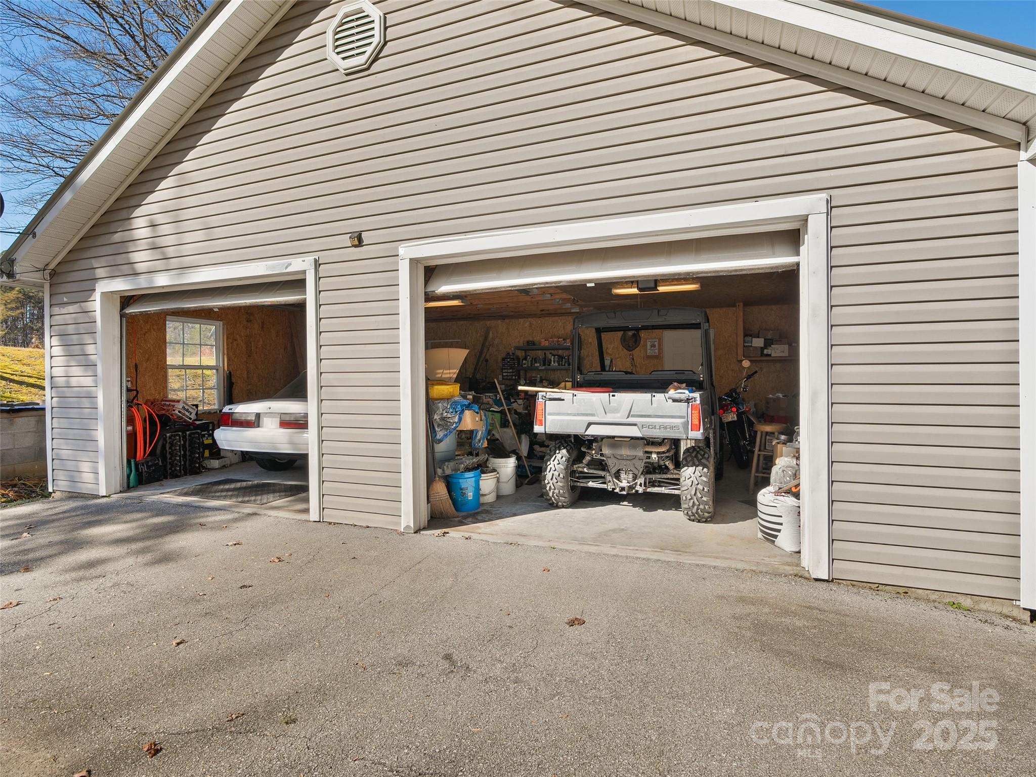 70 Pierce Elders Road Whittier, NC 28789 - Photo 25 of 36 a view of a livingroom with furniture and a ceiling fan