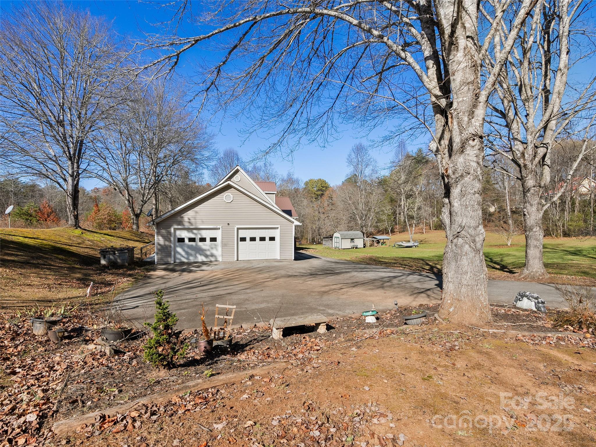 70 Pierce Elders Road Whittier, NC 28789 - Photo 27 of 36 a view of a house with a yard covered in snow