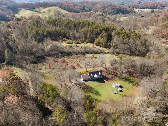 a view of swimming pool with a yard