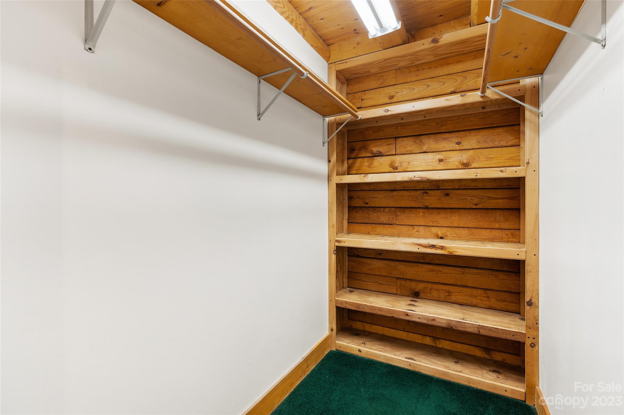 243 Penland Street Clyde, NC 28721 - Photo 12 of 20 a view of walk in closet
