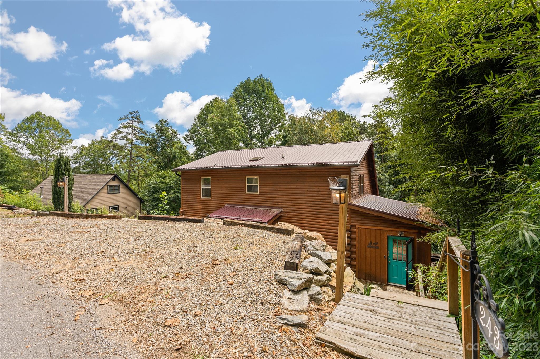 243 Penland Street Clyde, NC 28721 - Photo 3 of 20 front view of a house with a yard