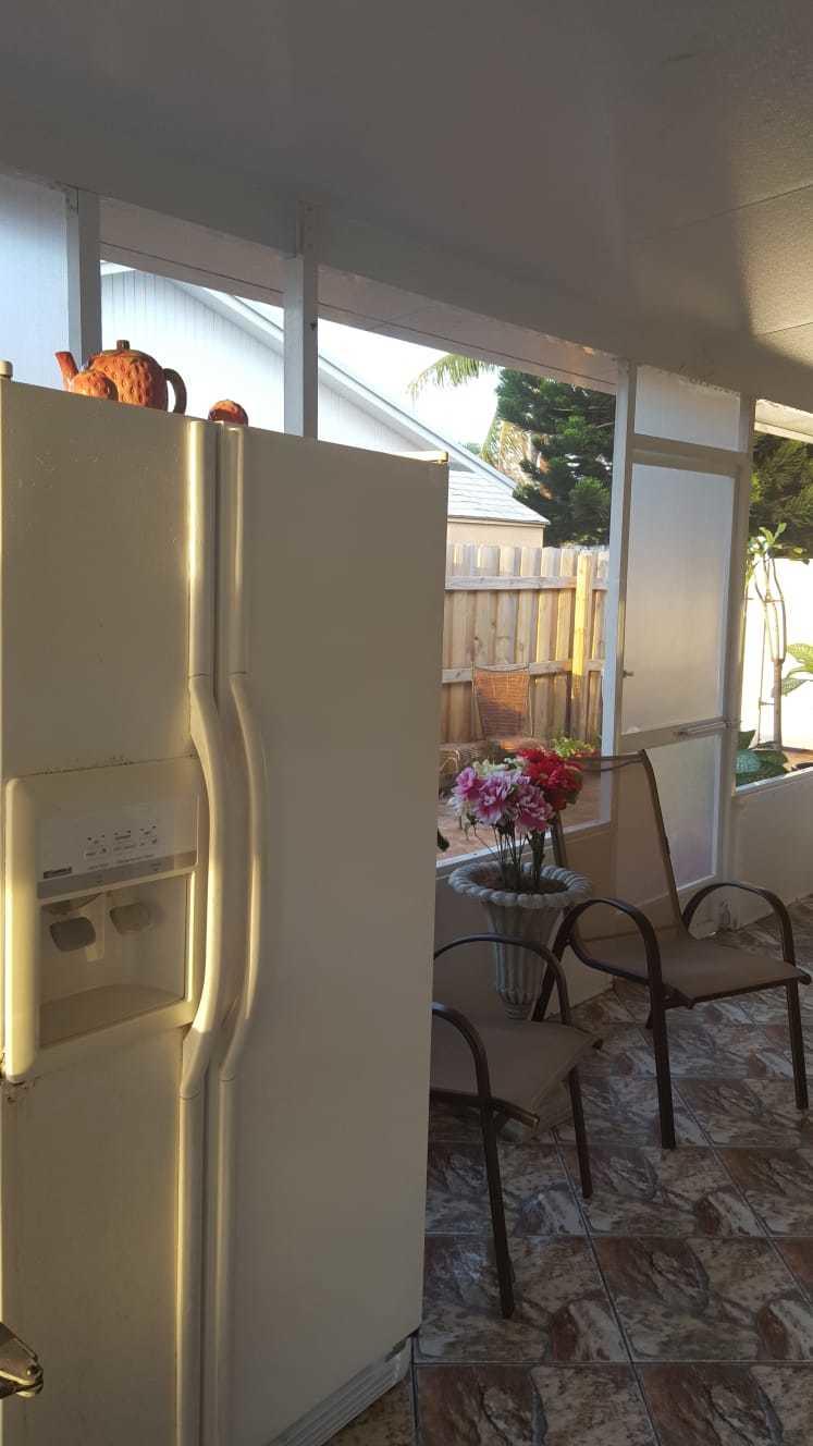 437 Kirk Road Palm Springs, FL 33461 - Photo 36 of 53 11-screen porche4
