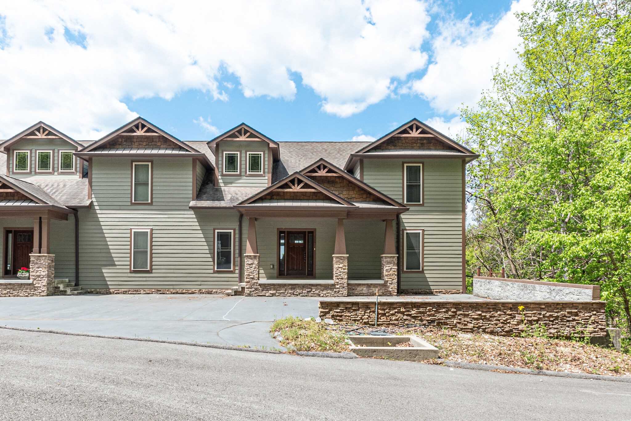 115 Vista Pt Road, Unit 115 Silver Point, TN 38582 - Photo 3 of 50 a front view of a house with a yard