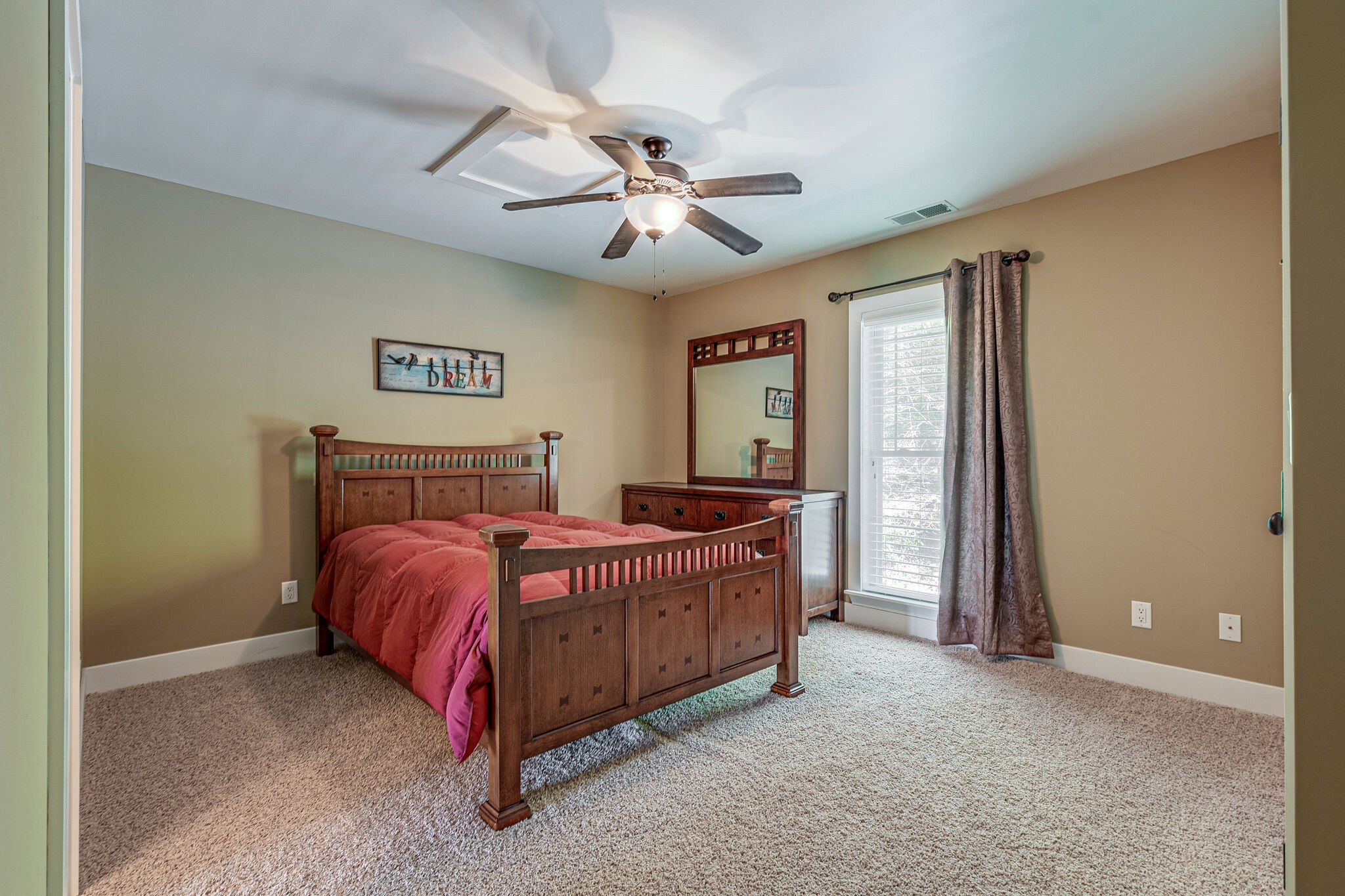 115 Vista Pt Road, Unit 115 Silver Point, TN 38582 - Photo 32 of 50 a bed room with a bed and a chandelier