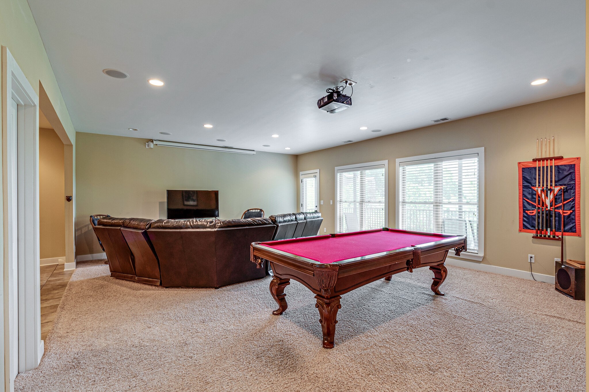 115 Vista Pt Road, Unit 115 Silver Point, TN 38582 - Photo 37 of 50 a living room with furniture a flat screen tv and a large window