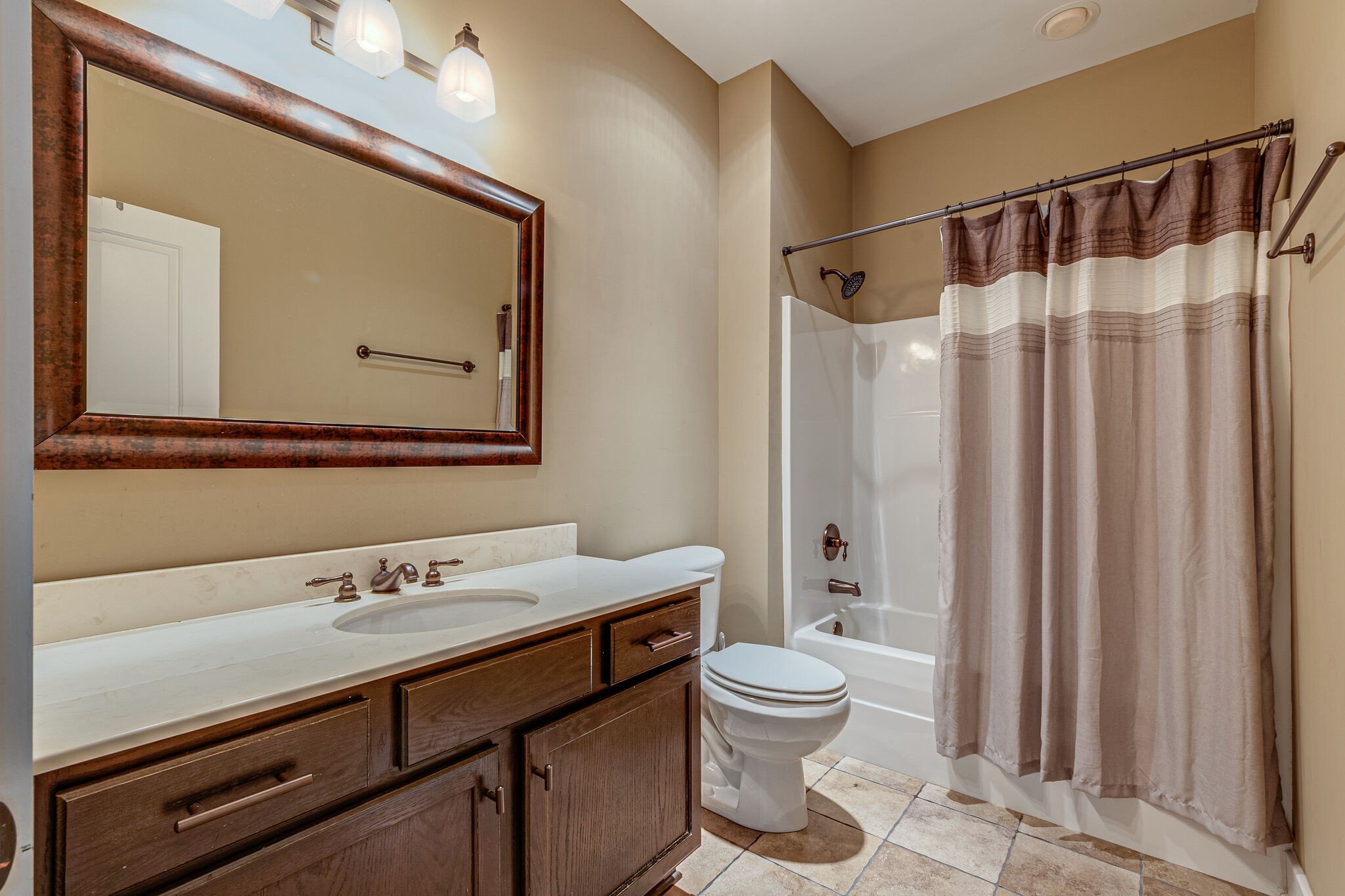 115 Vista Pt Road, Unit 115 Silver Point, TN 38582 - Photo 43 of 50 a bathroom with a toilet a sink and a mirror