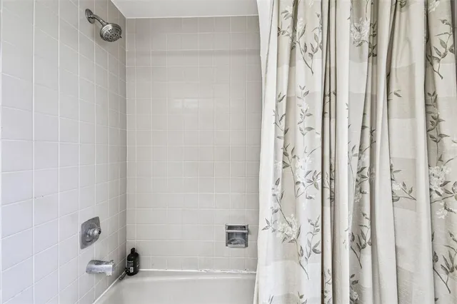 a living room with large windows