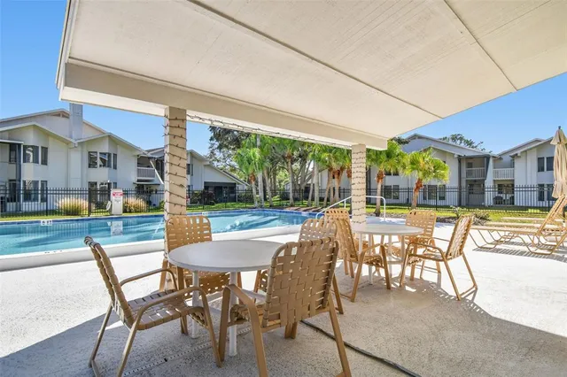 a view of a house with swimming pool