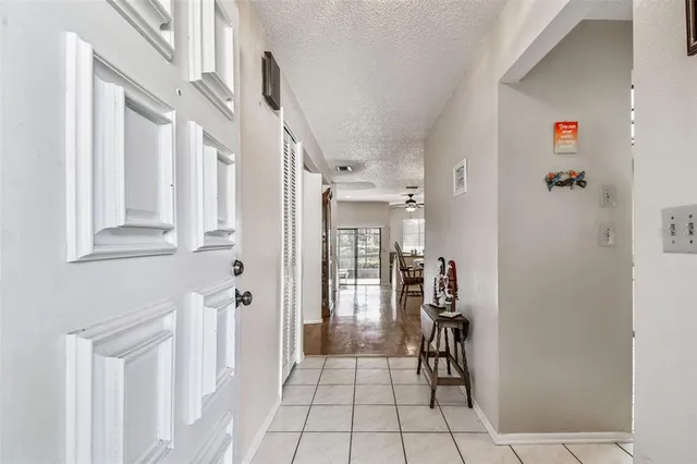 a view of entryway with a front door