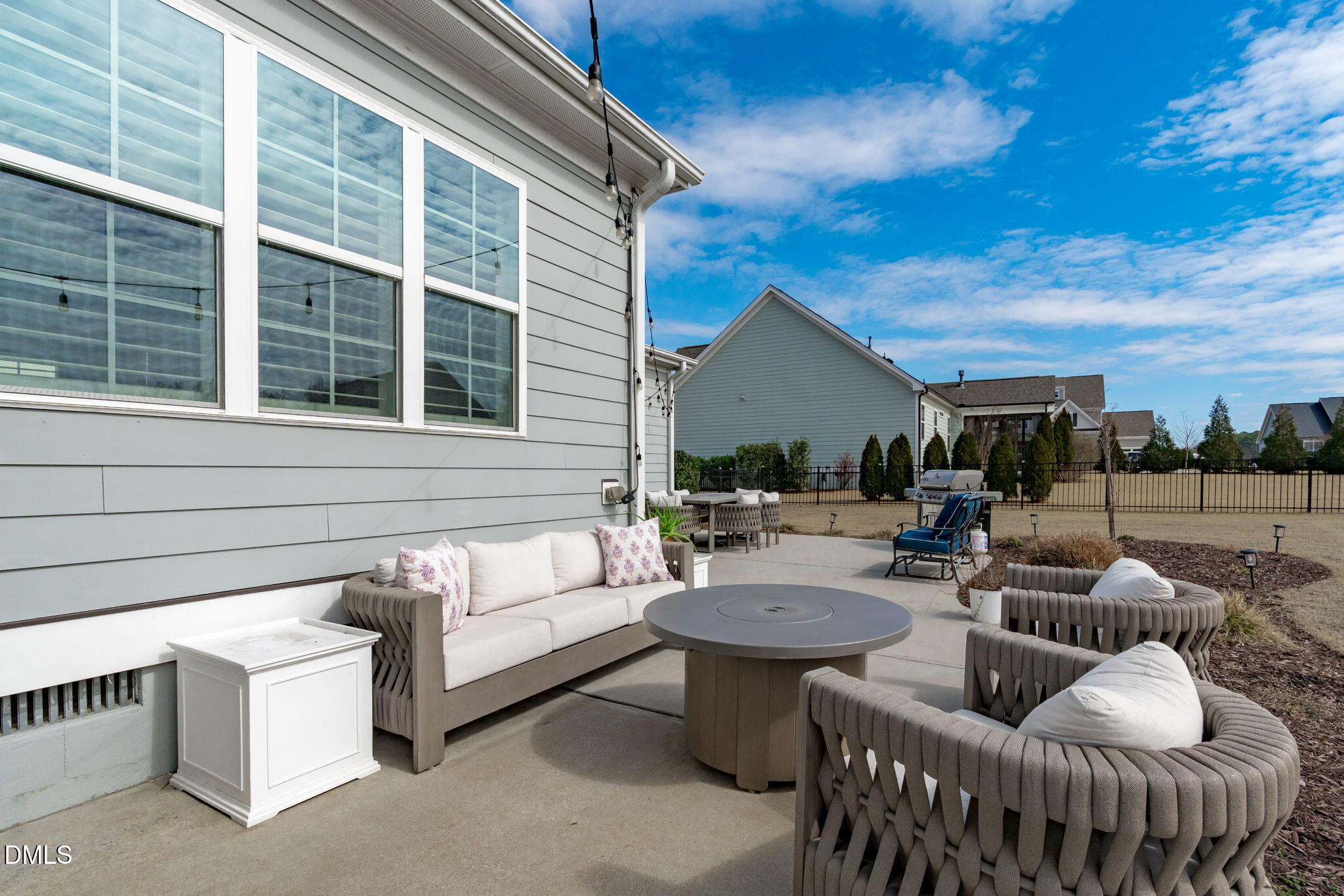 4144 Olde Judd Drive Willow Spring, NC 27592 - Photo 35 of 52 a view of a patio with couches and a fire pit
