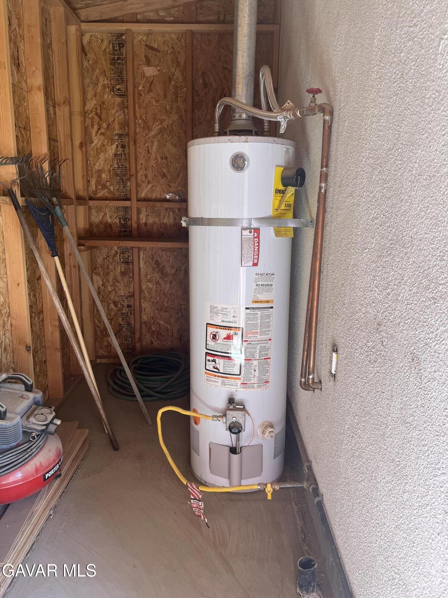 9241 East Ave R 14 Littlerock, CA 93543 - Photo 9 of 10 a bathroom with a sink and mirror
