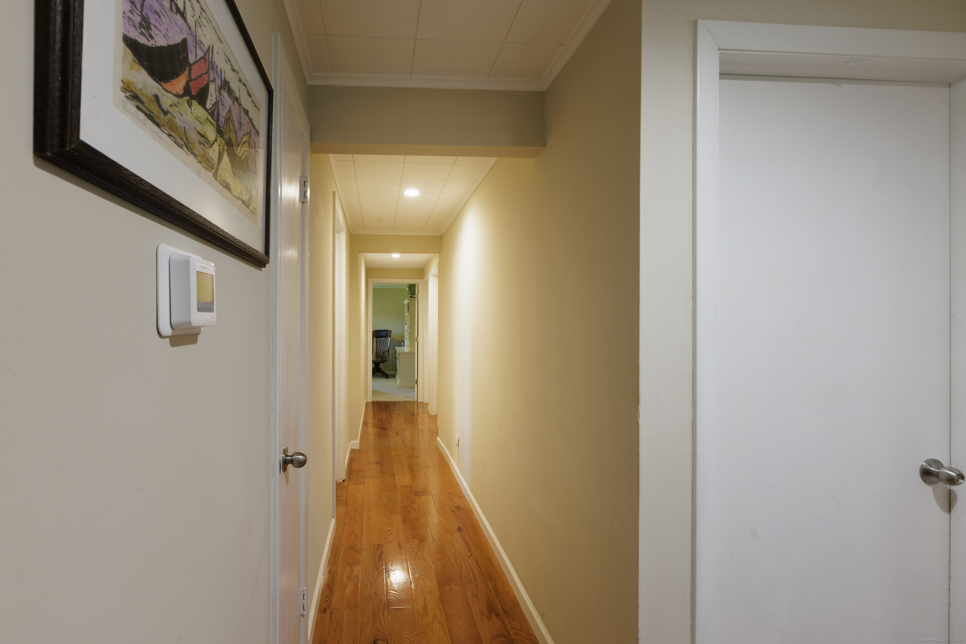 239 A Rockledge Road Lyme, CT 06371 - Photo 13 of 30 a view of a hallway with wooden floor
