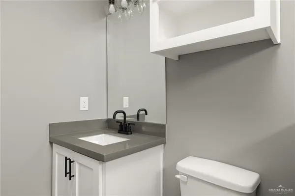 a bathroom with a sink and a toilet