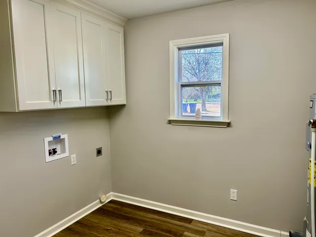 a view of cabinets and wooden floor