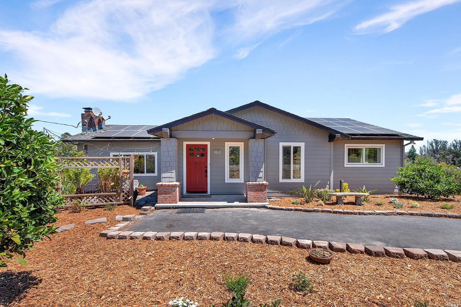 5495 Hutchinson Road Sebastopol, CA 95472 - Photo 1 of 1 a front view of a house with sitting area