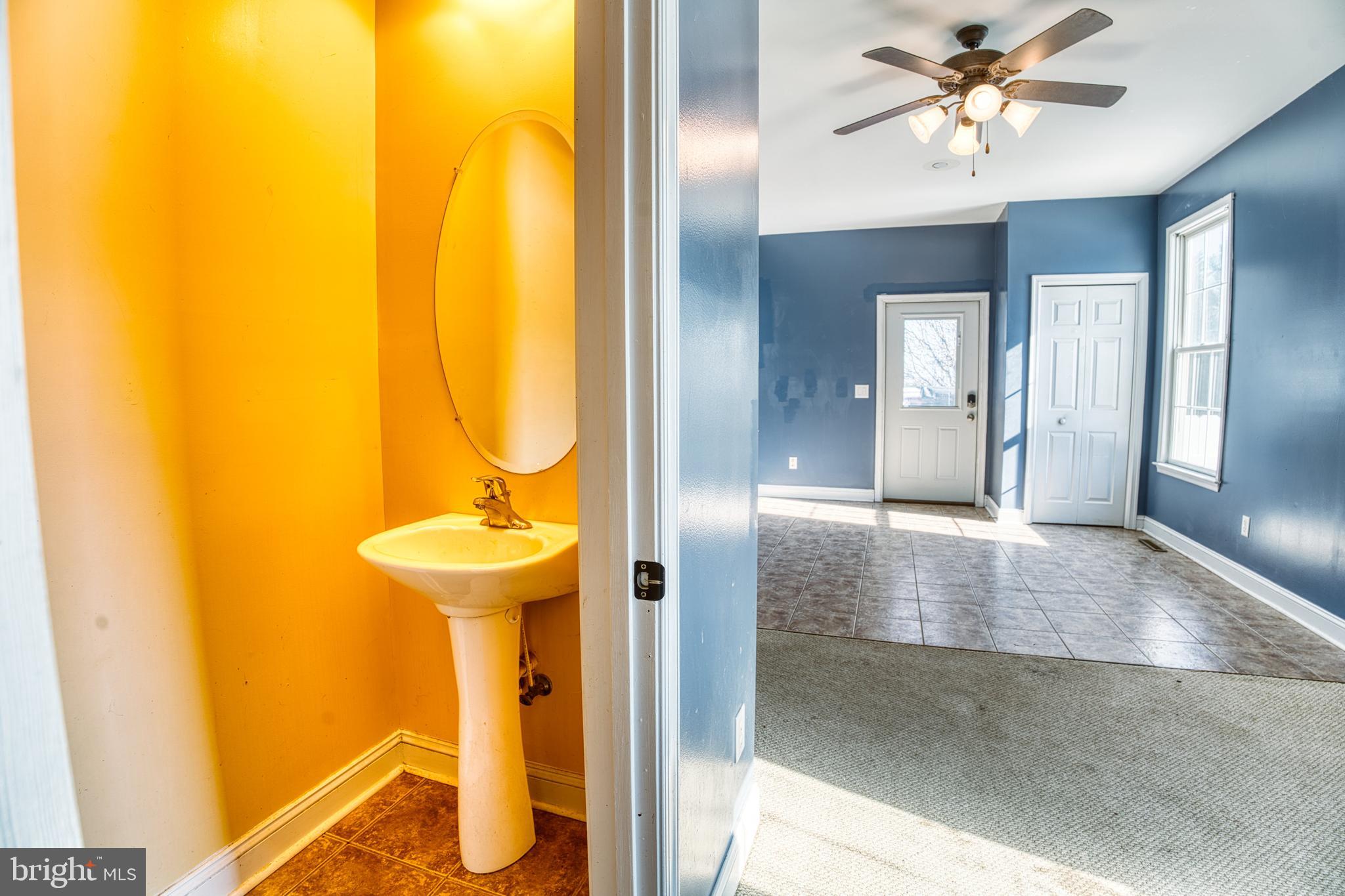 2412 Midstate Road Felton, DE 19943 - Photo 12 of 93 a view of a hallway with a bathroom