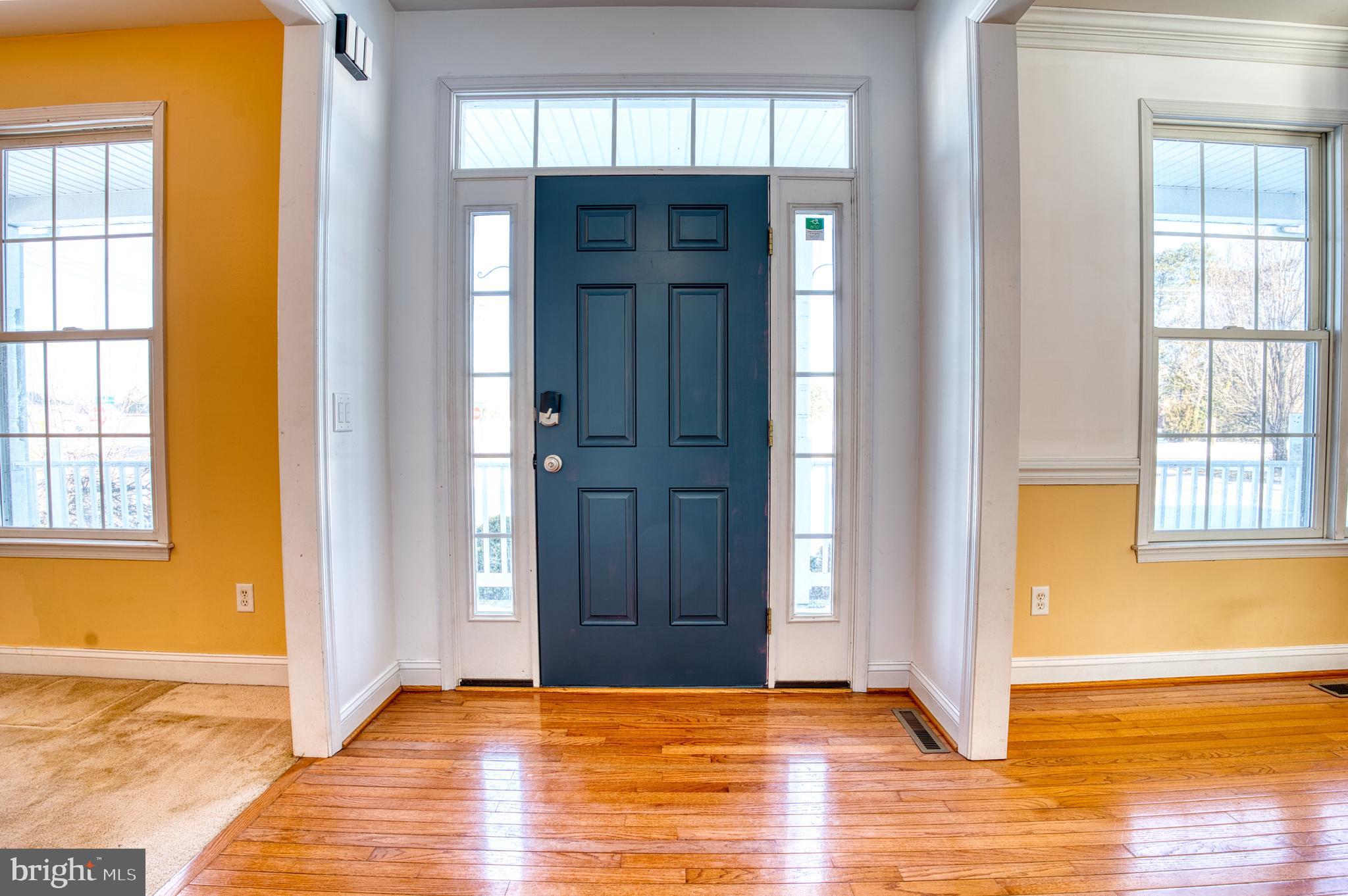 2412 Midstate Road Felton, DE 19943 - Photo 27 of 93 a view of an empty room with window and wooden floor