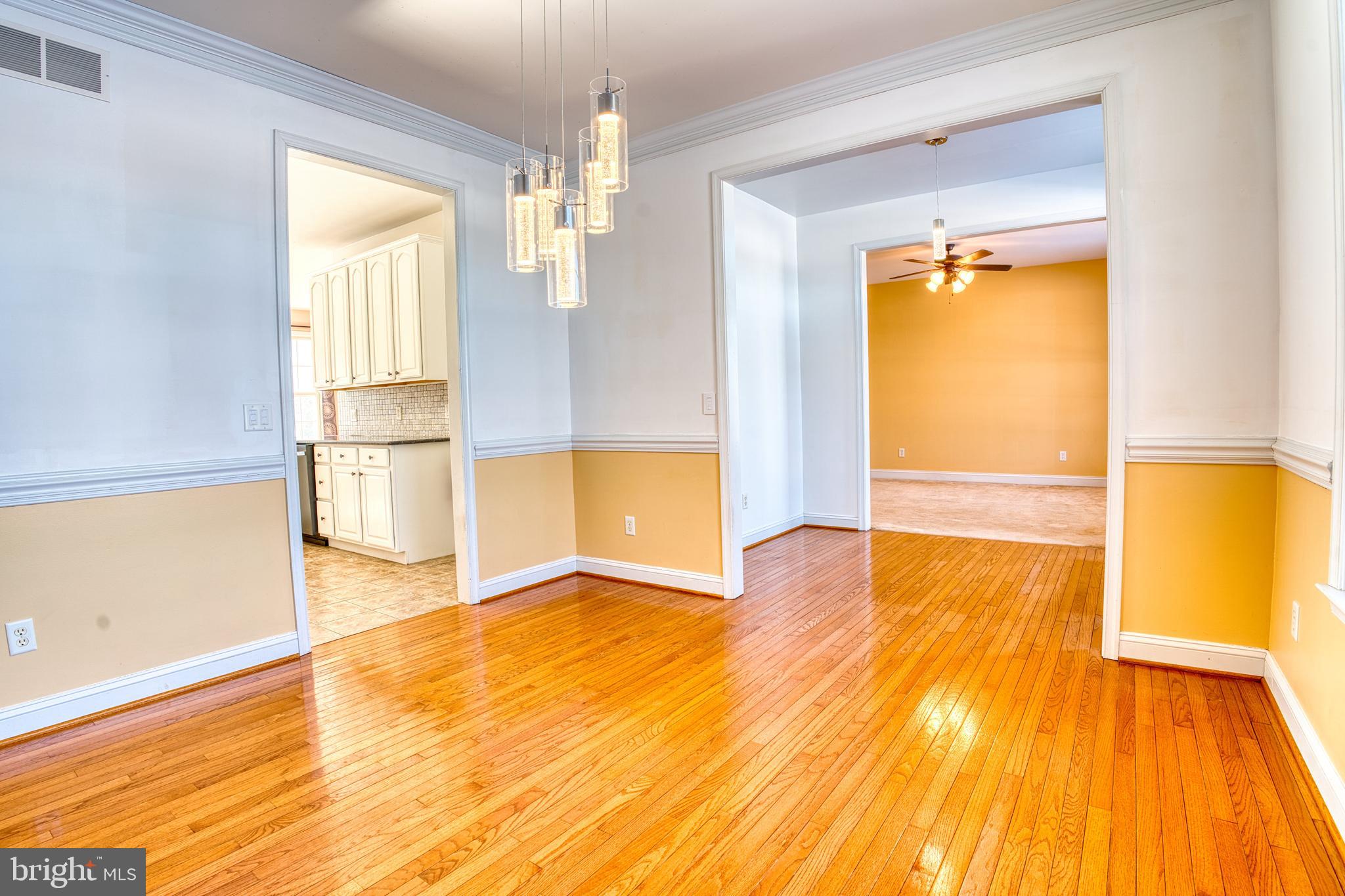 2412 Midstate Road Felton, DE 19943 - Photo 29 of 93 a view of empty room with wooden floor and fan