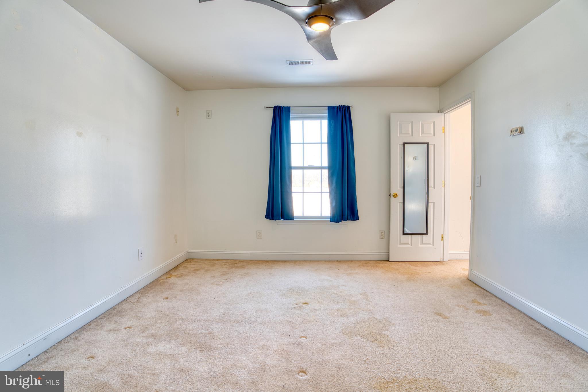 2412 Midstate Road Felton, DE 19943 - Photo 31 of 93 an empty room with windows