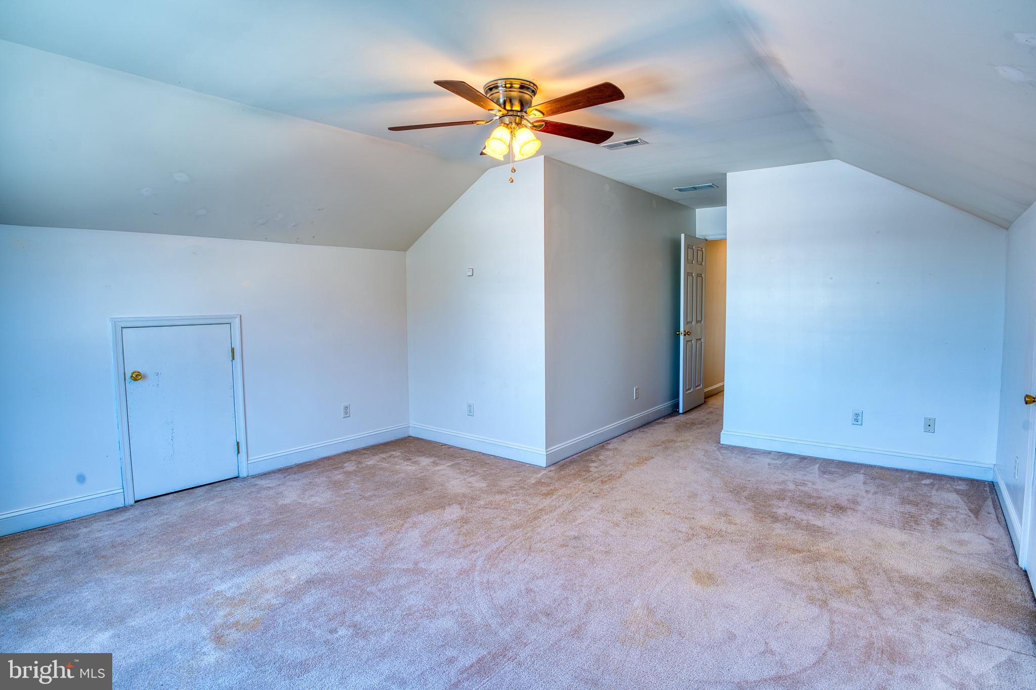 2412 Midstate Road Felton, DE 19943 - Photo 43 of 93 an empty room with closet and a ceiling fan