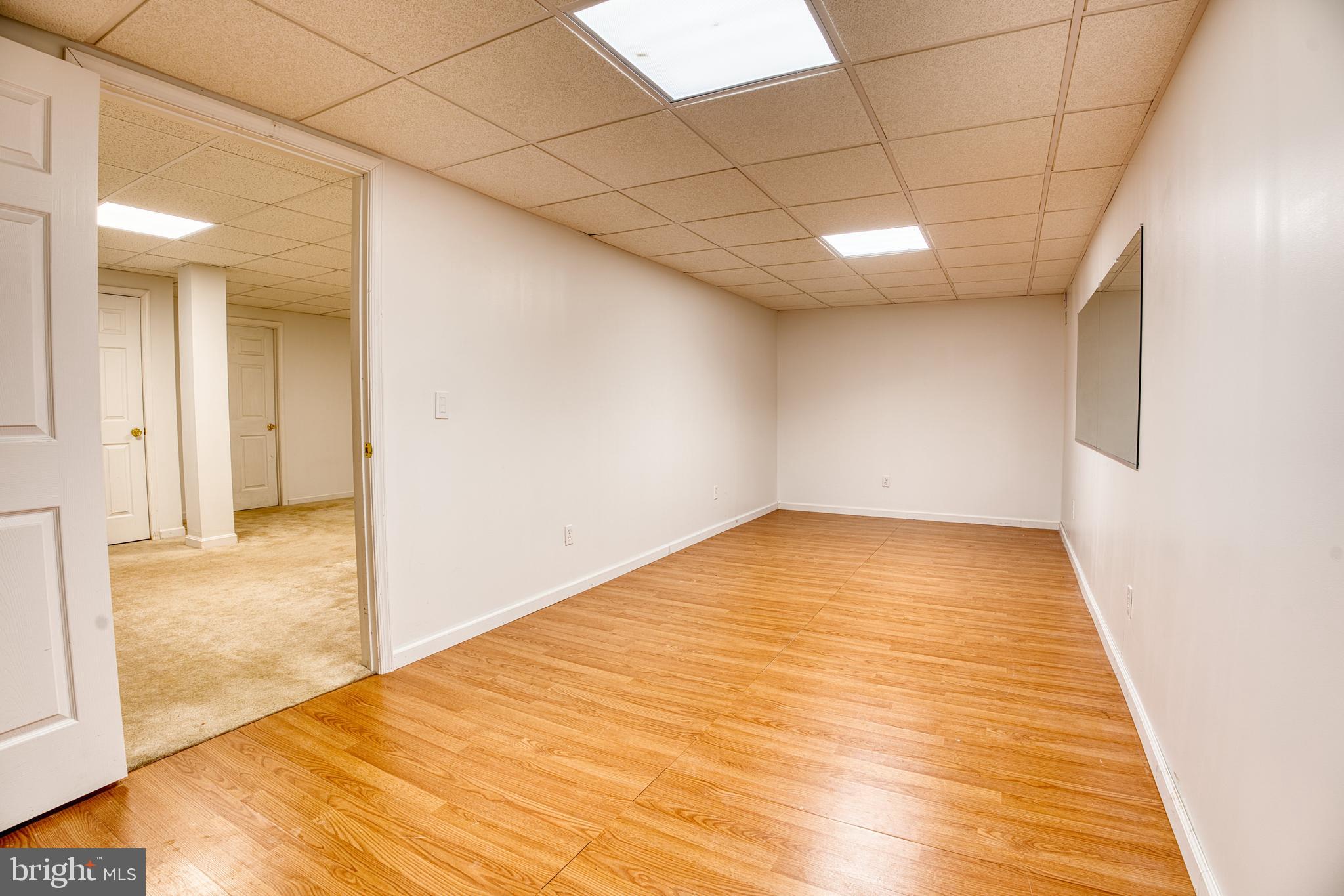 2412 Midstate Road Felton, DE 19943 - Photo 61 of 93 a view of empty room with wooden floor