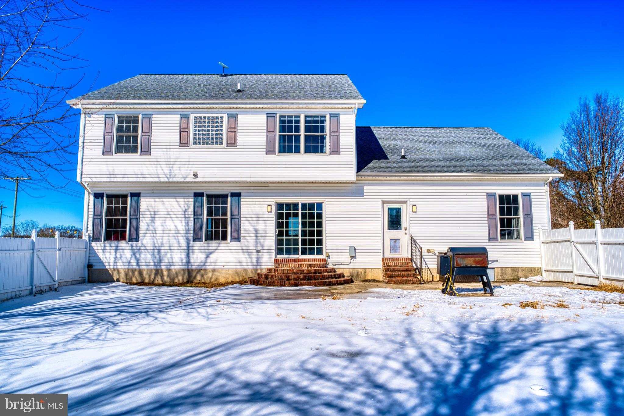2412 Midstate Road Felton, DE 19943 - Photo 80 of 93 a front view of a house with a patio