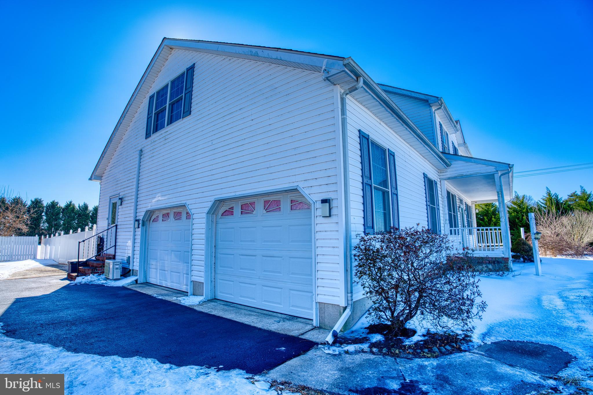 2412 Midstate Road Felton, DE 19943 - Photo 8 of 93 a front view of a house with garden