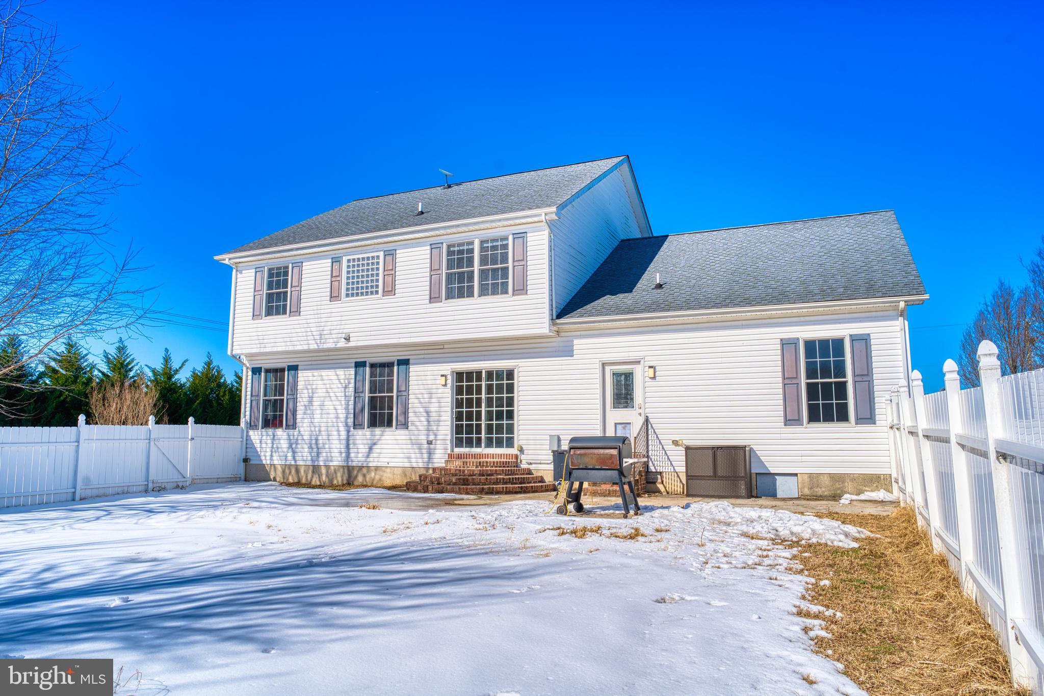 2412 Midstate Road Felton, DE 19943 - Photo 81 of 93 a front view of a house with basket ball court