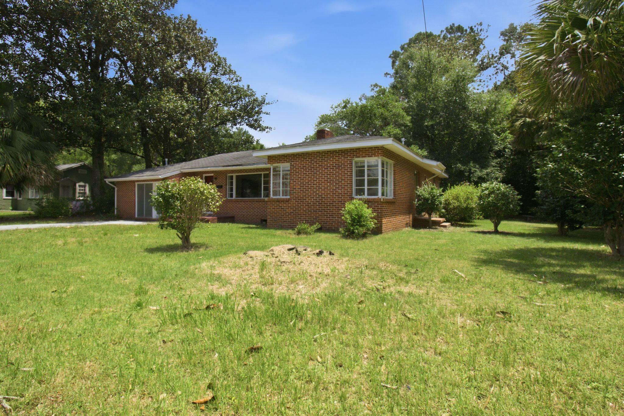 855 North Pearl Street Crestview, FL 32536 - Photo 30 of 31 a view of a house with backyard and garden