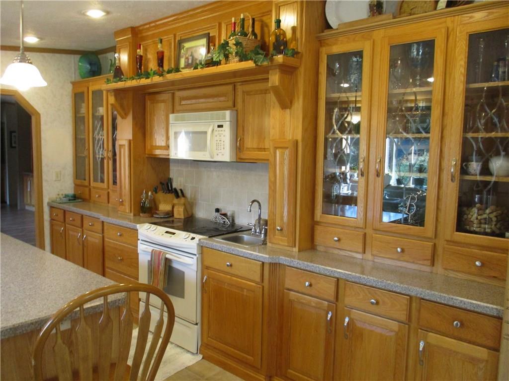 2039 Eastern Road Warren, ME 04864 - Photo 6 of 20 Kitchen includes many cabinets, two...