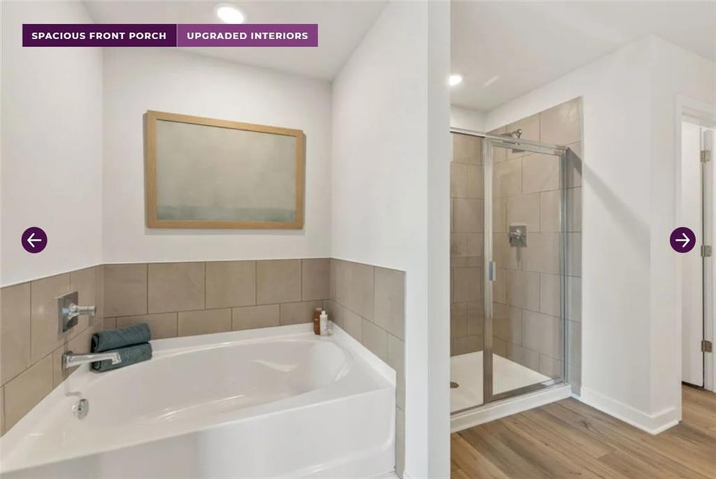 30 Poplar Blf Way Jefferson, GA 30549 - Photo 27 of 31 a bathroom with a bathtub and a shower